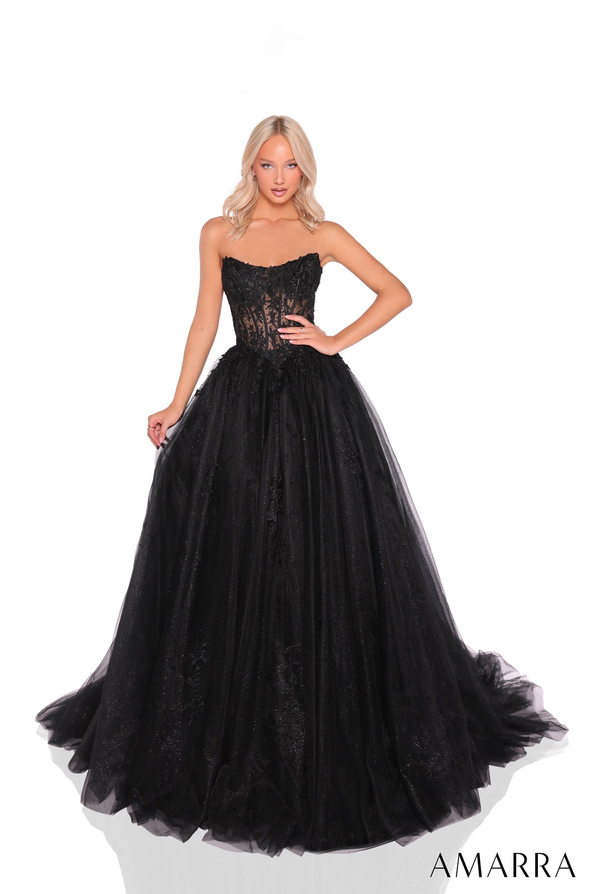 Black strapless gown with a textured bodice and flowing skirt on a white background, featuring the brand 'AMARRA'.
