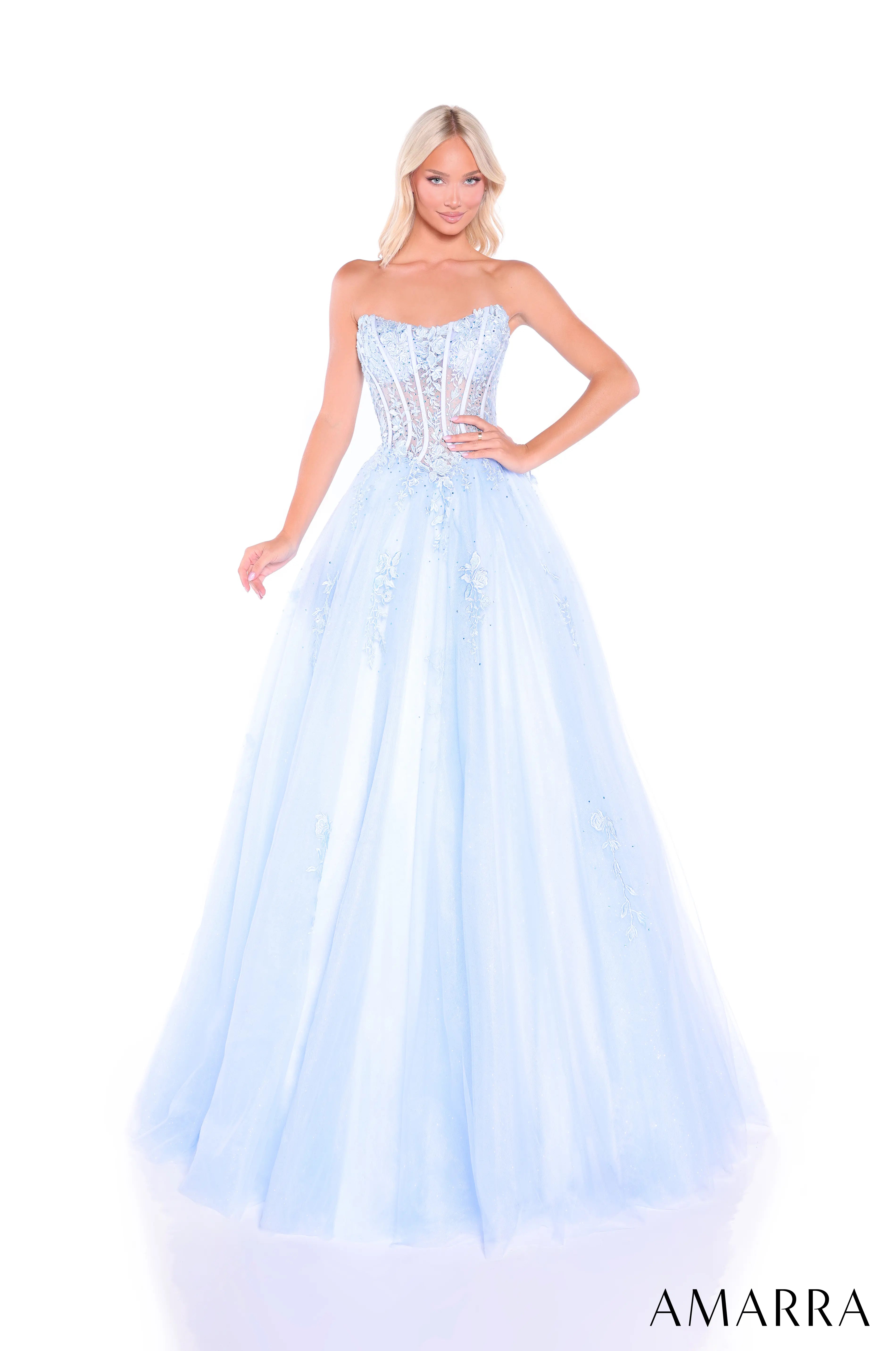 Woman wearing a light blue strapless gown 