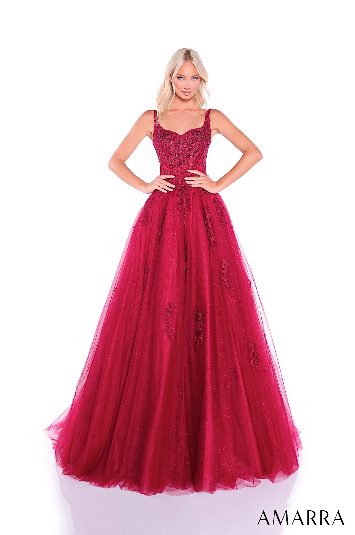 Woman wearing a red evening gown with 'AMARRA' branding on a white background