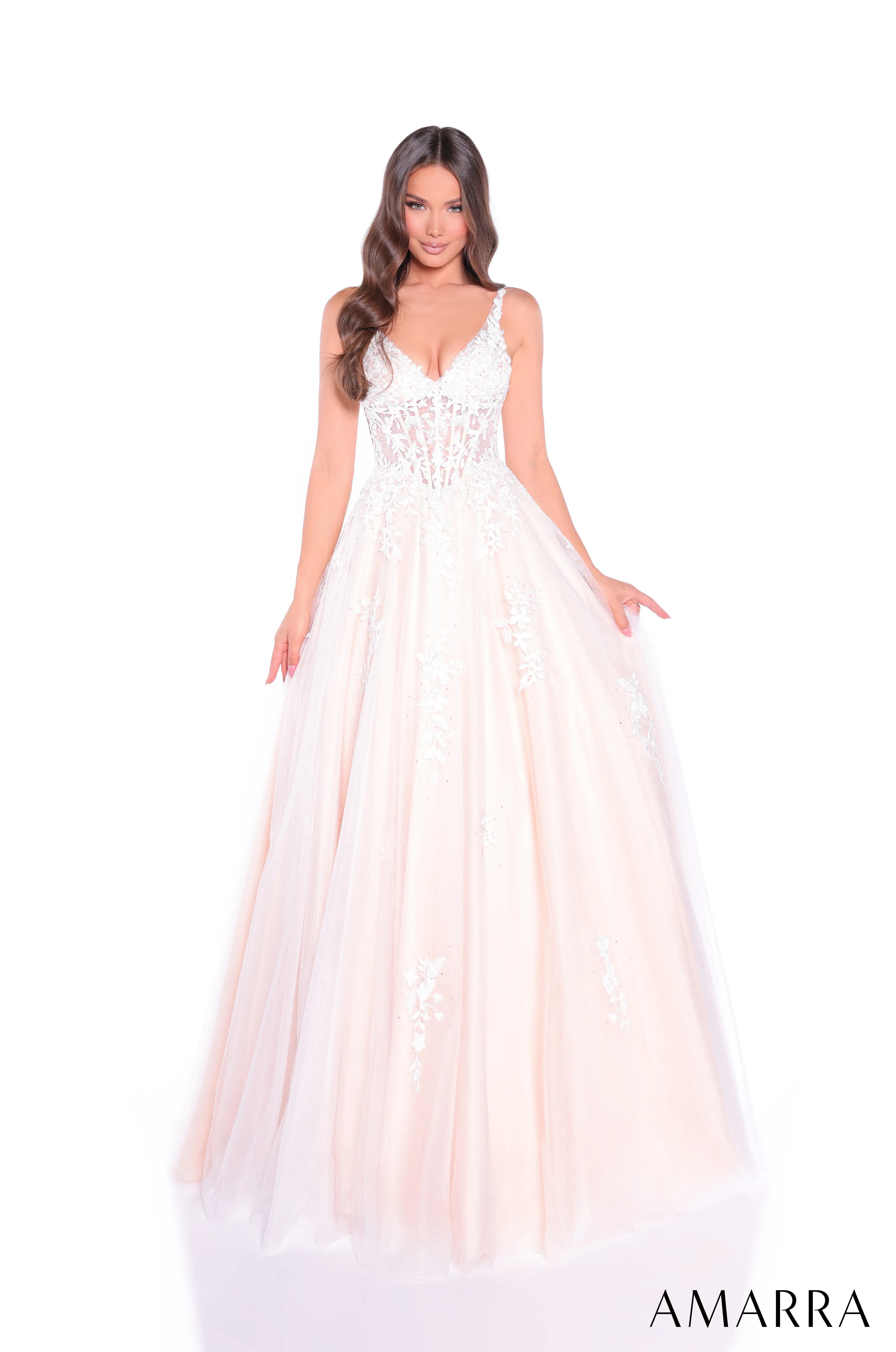 Woman wearing a white evening gown with 'AMARRA' branding on a white background